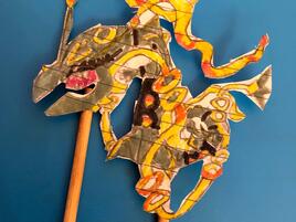 mythic dragon puppet on 2 sticks