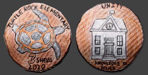 hand drawn coin design with a turtle and words Turtle Rock Elementary with drawing of school on the other side and the word Unity