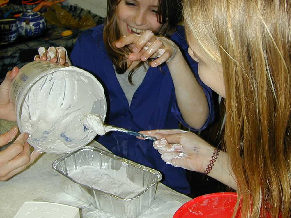 pouring plaster on top of bones