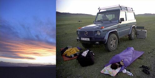 sunrise and a team member sleeping in a sleeping bag near a jeep