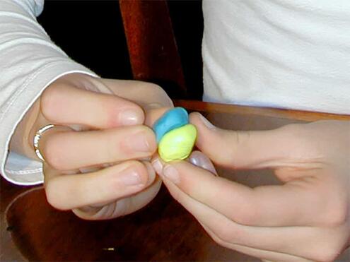 molding the nucleus with 2 different colors of clay