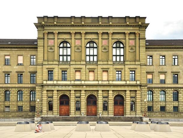 3-story building with columns, steps, and large windows on the ETH Zurich campus.