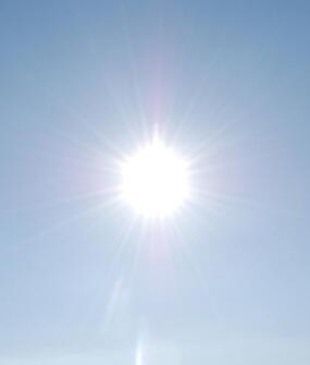 sun with sunrays on the sky