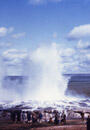 A large, upward pillar of water emerging from a hot spot.
