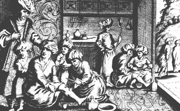An engraving from the 1600s showing physicians removing guinea worms from a patient's leg.