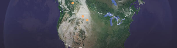 A map of the United States and lower Canada with three dots indicating locations in Alberta, Canada and Northwestern states like Montana and South Dakota.