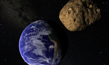 Viewed from space, an asteroid about 2/3 the size of Earth collides towards the globe