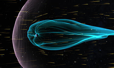 Graphic representation shows how ionized particles from solar wind deflect off of Earth’s magnetic field