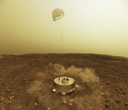 Visualización de la sonda Huygens aterrizando en Titán.