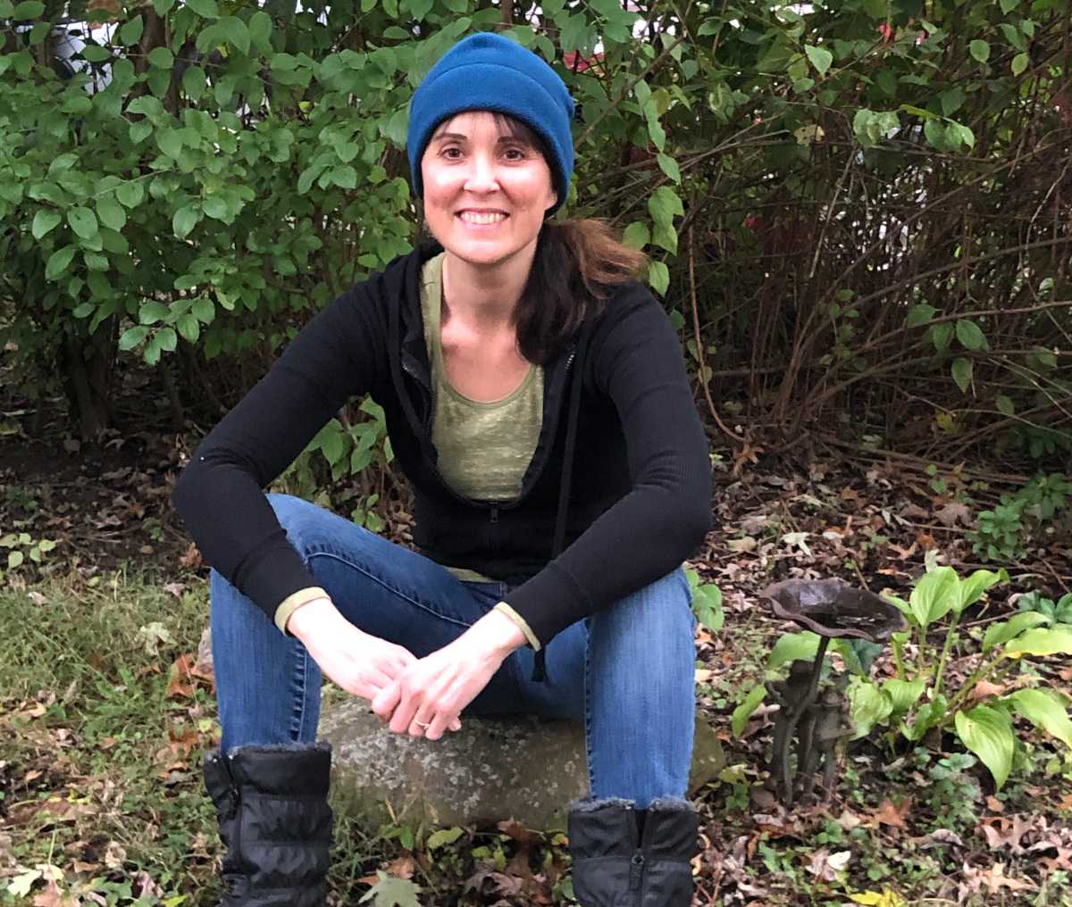 photo of Valerie Katz sitting outside on the ground