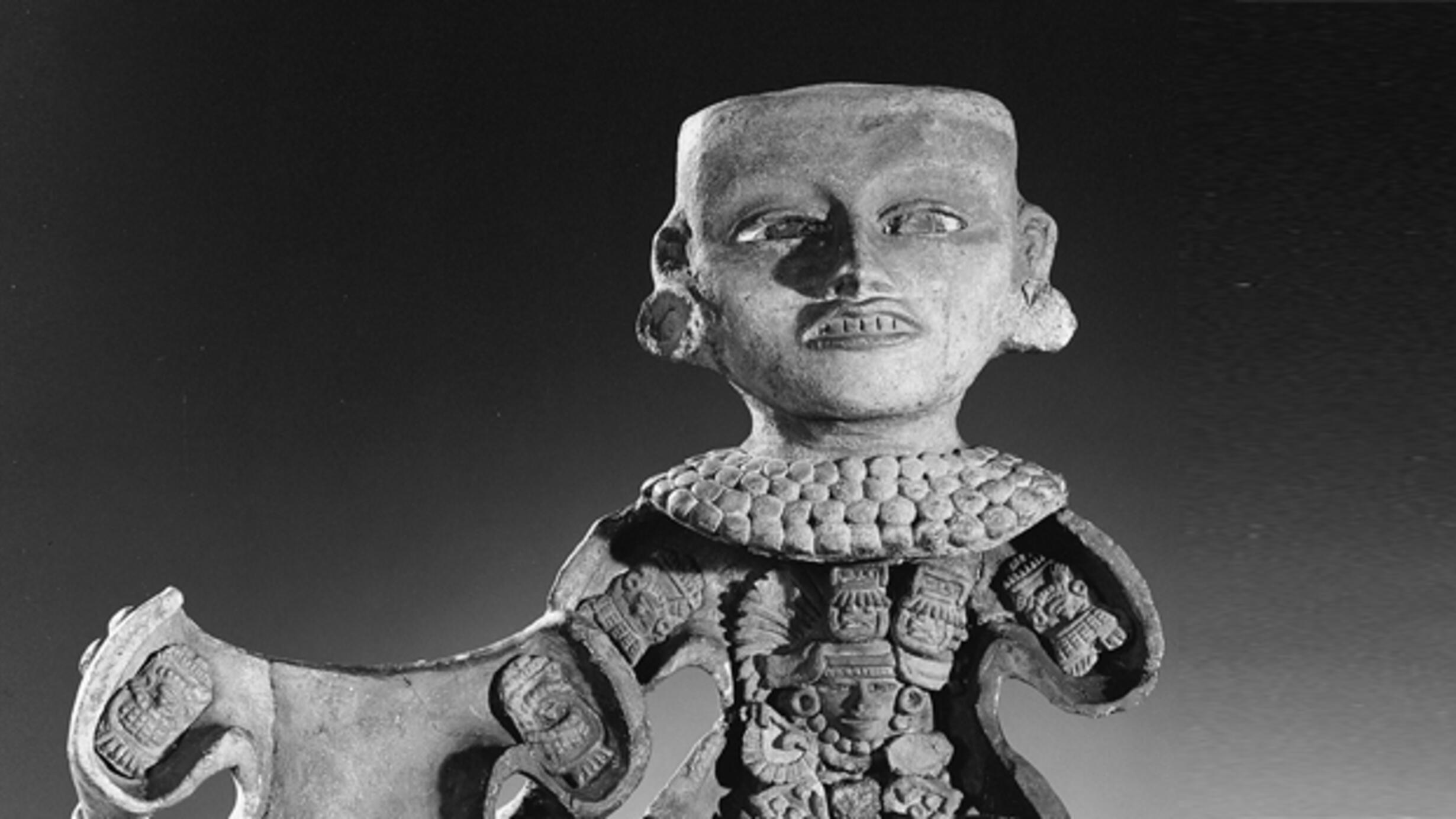 An elaborately carved figure of a human, from the Museum's Hall of Mexico and Central America.