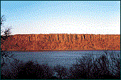 The red cliffs of the Palisades, viewed from across the Hudson River