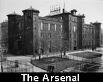 A black and white photograph of the former Arsenal, an imposing brick building located at 64th Street and Fifth Avenue in what is now Central Park.