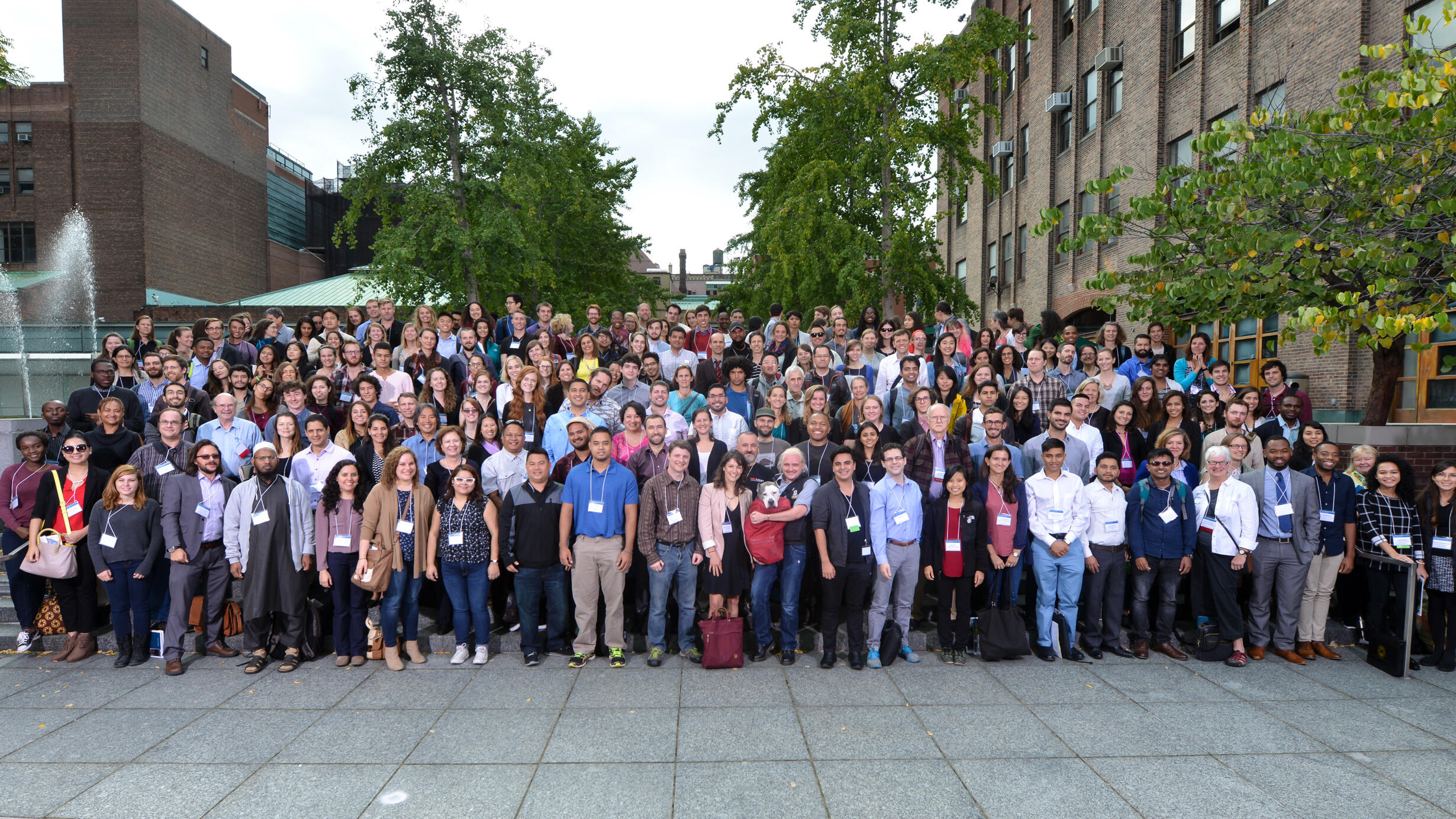 Around 200 Student Conference on Conservation Science participants pose in tiered rows.