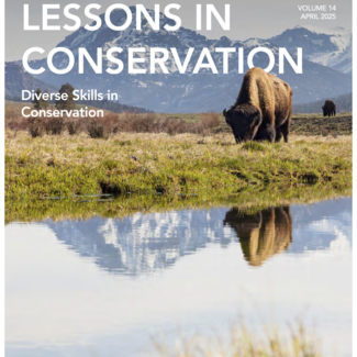 The cover of lessons in conservation has a bison reflected in the water with mountains behind.