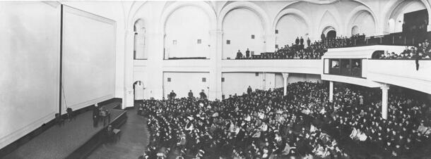 Photograph of public school children at lecture given by Professor Albert Bickmore in the LeFrak Theater, March 25, 1904