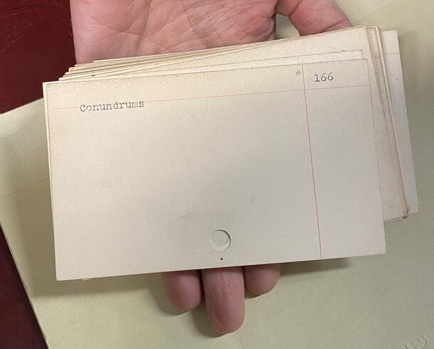 Close-up of 'conundrums' subject card, AMNH card catalog.