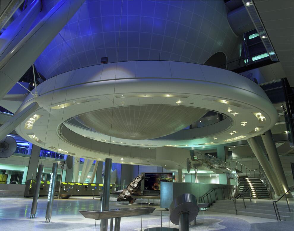 Photograph of the Hayden Sphere with Cosmic Pathway, above, and Hall of the Universe, below, Rose Center for Earth and Space, 2017.