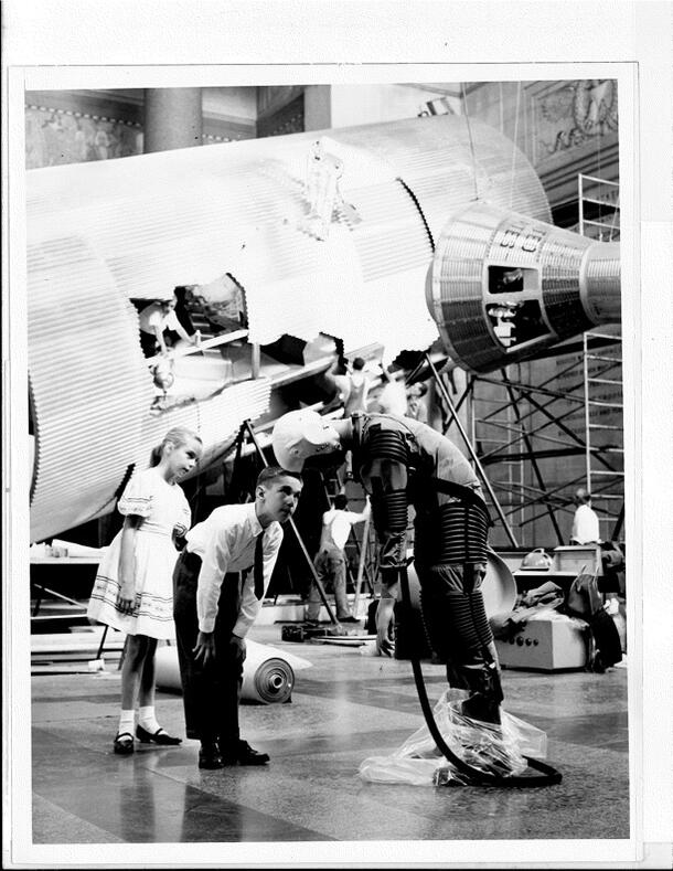 Press release photograph of children at the Man in Space exhibit, 1961