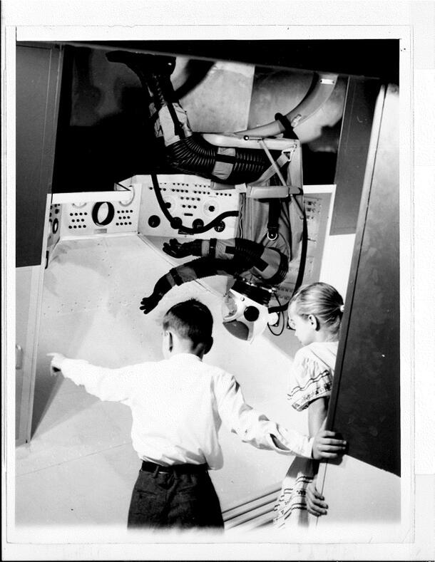 Press release photograph of children and ARIES laboratory at Man in Space exhibit, 1961