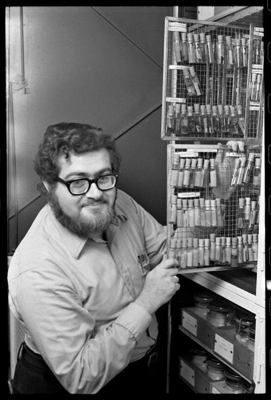 Norman Platnick showing vial storage panel, 1970