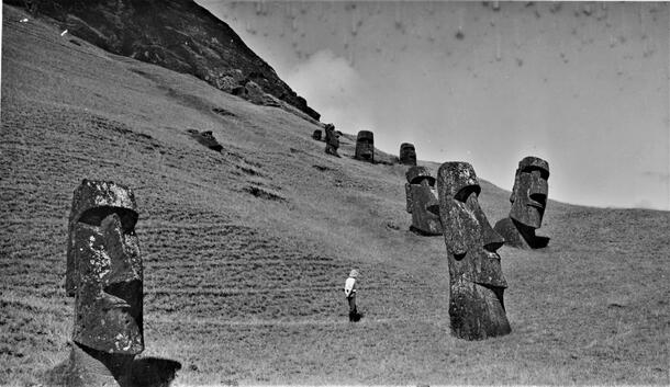 Man walking on Rapa Nui (Easter Island) among the Moai 