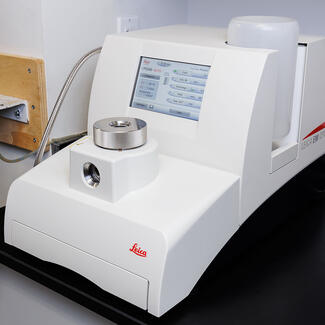 Leica EM CPD 300 instrument sits on a lab table in the Musuem's Microscopy and Imaging Facility.
