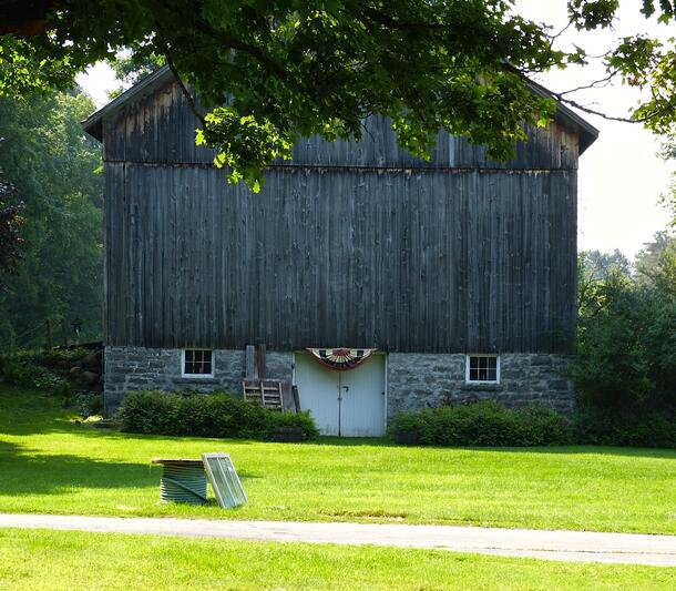 The gray barn where the trilobite fossils from the Walcott Rust Quarry were initially stored.