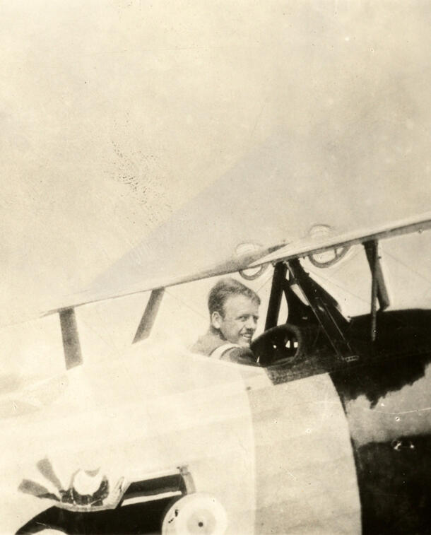 Quentin Roosevelt sitting in a small plane.