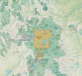 Map of Yellowstone National Park represented in one color, and the greater Yellowstone area surrounding it represented in a different color.
